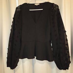 Chic Black Blouse with Textured Sleeves